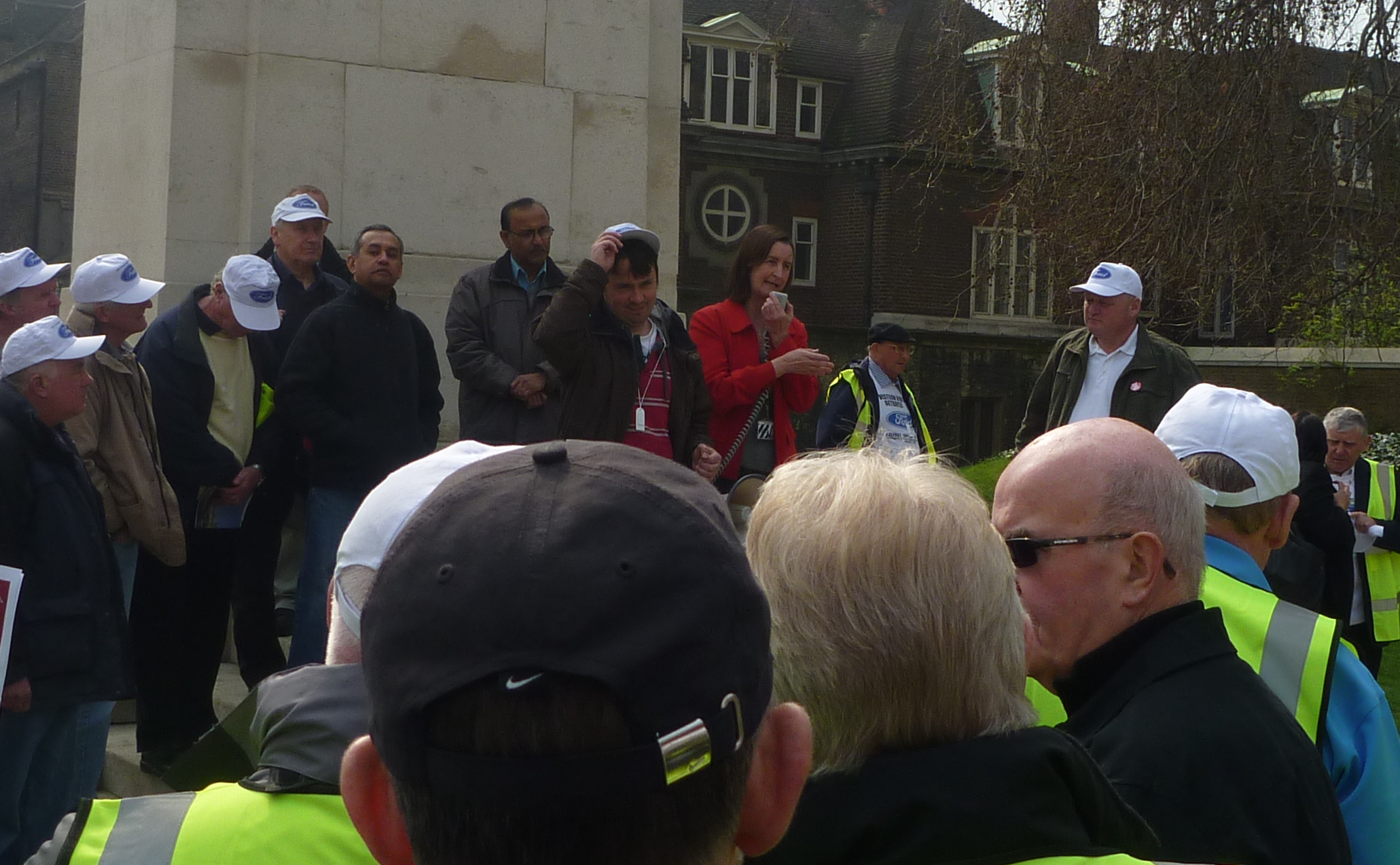 Nia addressing former Visteon workers at the rally outside Parliament